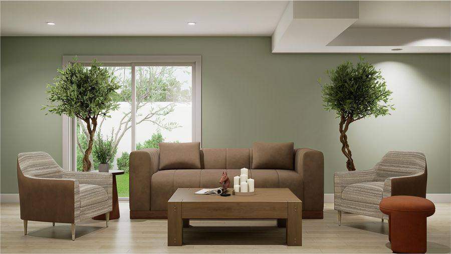 A lounge with a sofa, armchairs, a coffee table and tall windows onto the garden